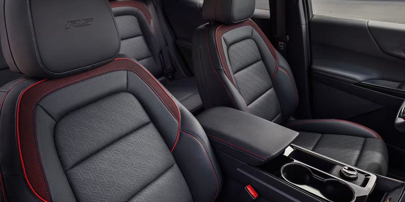 Black leather interior with red accents in a 2025 Chevrolet Equinox