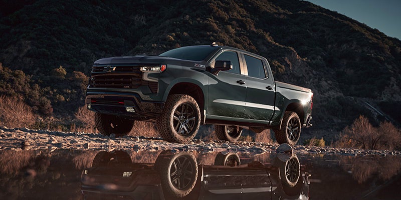 2025 Chevy Silverado 1500 parked on stone gravel