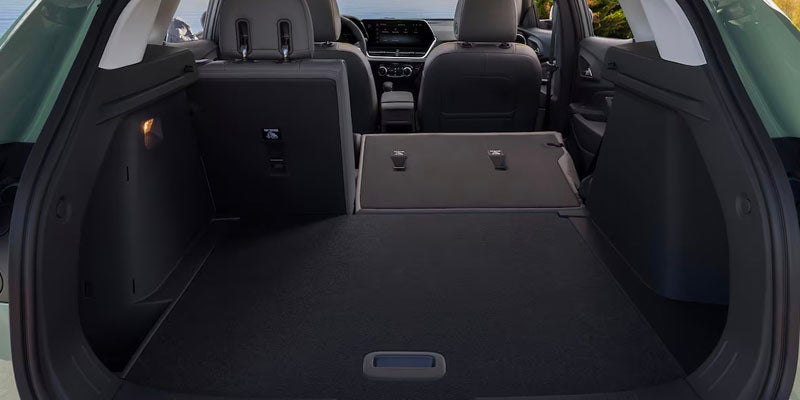 The interior of a 2025 Chevy Trax with seats down to showcase interior space
